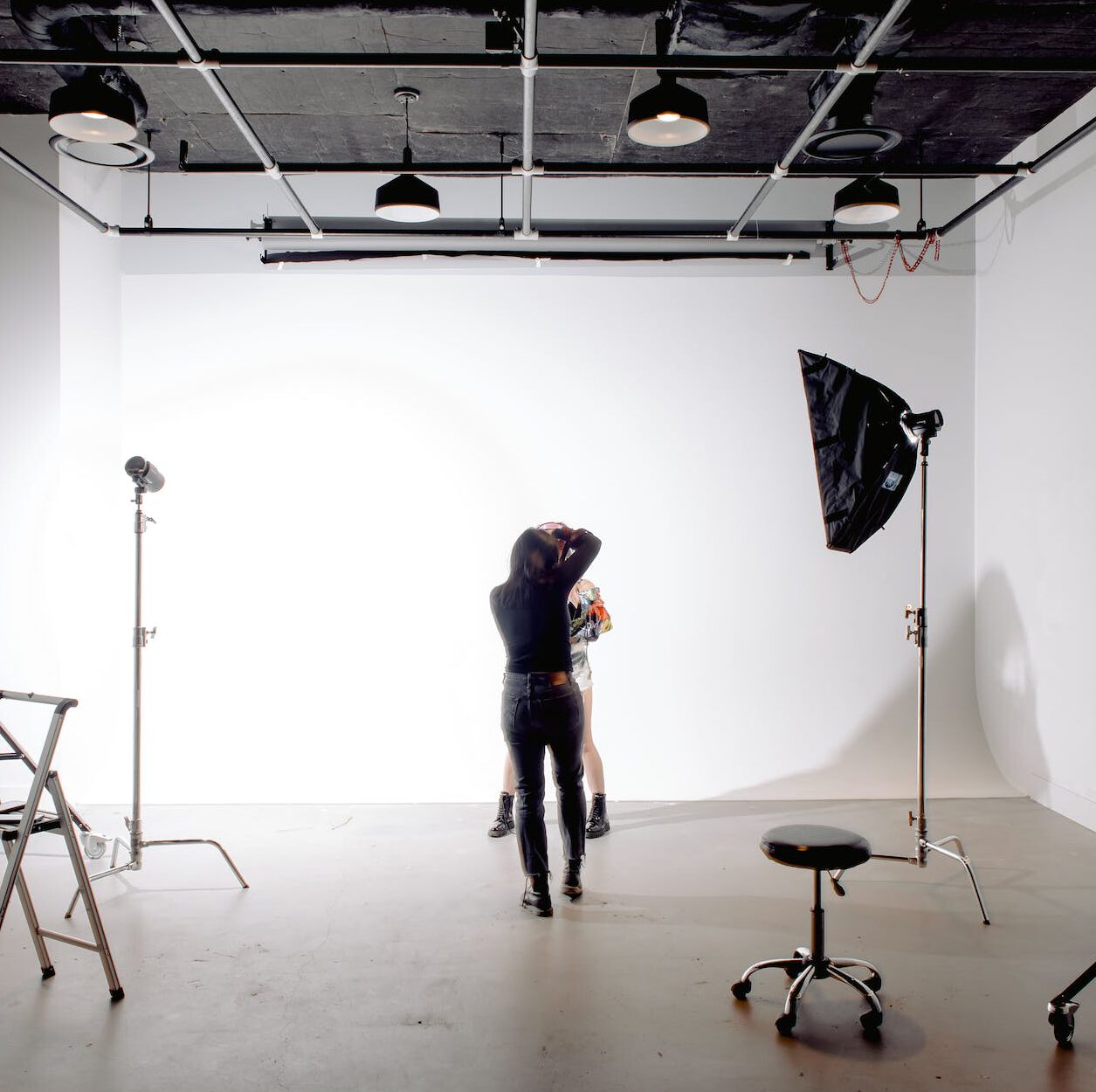 professional photographer during photo shoot in studio